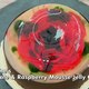 Hermine's chocolate and raspberry mousse jelly cake decorated as a poppy flower